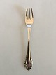 Georg Jensen 
Silver 830S 
Lily of the 
Valley Cake 
Fork No 043. 
Measures 14.3 
cm / 5 5/8"