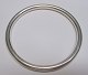 Solid arm ring 
in sterling 
silver, Knud 
Barslund, 
Holstebro, 
Denmark. 
Weight: 42.7 
cm. Diameter: 
...