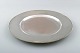 Evald Nielsen 
coverplate of 
hammered 
sterling silver 
with beaded 
border.
Made and 
stamped by ...
