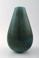 Tidlig Saxbo, keramik vase i moderne design.
Smuk glasur i grønne toner.