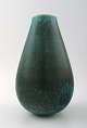 Early Saxbo, ceramic vase in modern design.
Beautiful glaze in green tones.