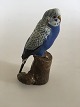 Aluminia 
Ceramic 
Figurine of 
Budgerigar No. 
477/3188. 14.5 
cm H. In fine 
condition.