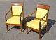 Pair of antique 
mahogany arm 
chairs. 19th 
century Empire 
copies. With 
intarsia. With 
polster. H. ...