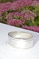 Napkin ring 
with toweres 
marks / 830 
silver, from 
1935.  length 
4.8 x 3.5 cm. 
height  1.7 cm. 
...
