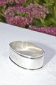 Napkin ring 
with toweres 
marks / 830 
silver, from 
1930.  length 
4.7 x 2.9 cm. 
height  1.5 cm. 
...