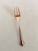 "Anne Marie" 
Cake Fork. 
Frigast 
Silverplate 
Denmark. 14 cm 
L.