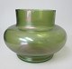 Vase of 
irrigated green 
glass, approx. 
1900, Loetz, 
Germany. 
Height: 7.5 cm.