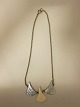 Necklace made of pewter
Necklace with a pendant made of bone
Design: Poul Warmind
We have a large choice of jewellery with design 
by Poul Warmind