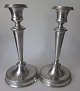 Pair of pewter 
candlesticks, 
1838, Germany. 
With smooth 
stem. 
Decorations on 
foot. Height: 
20 ...