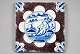 Dutch tile, 
blue and 
manganese 
decorated, 
approx. 1750. 
Decoration in 
the form of 
shepherds. 13 
...