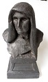 Sinding, 
Stephan (1846 - 
1922) Denmark: 
Bust of an 
elderly woman. 
Black clay. 
Height: 32.5 
cm. ...