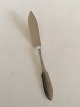 Georg Jensen 
Stainless Matte 
"Mitra" Fish 
Knife. Measures 
19.5 cm / 7 
43/64 in.