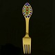 A. Michelsen. 
Christmas Fork 
- 1998 - Three 
Red Suns.
Designed by 
Carl-Henning 
Pedersen
Gilded ...