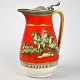 English pitcher 
with pewter 
lid. 19th 
century H: 19 
cm.