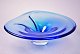 Large blue 
design glass 
dish, 1960s. 
Length: 38 cm. 
B: 31 cm. 
Height: 10 cm.