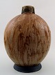 French ceramist. Ceramic vase in stylish design.
