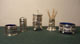 Salt, pepper 
pot, toothpick 
holders, 
mustard jar. 
Silverplated