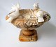 Small alabaster 
table bowl with 
4 white 
pigeons, 19/20. 
C. Italy. 
Yellow 
alabaster with 
white ...