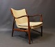 The NV45 
recliner, 
designed by 
Finn Juhl in 
1945 and 
manufactured by 
Niels Vodder in 
the late ...