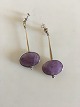 Georg Jensen 
Sterling Silver 
Torun Earrings 
No 245 with 
Amethyst. 
Measures 6 cm x 
2.5 cm( 2 ...