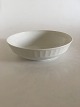 Royal 
Copenhagen 
White Fan Bowl 
No. 11526. 6 cm 
H. 22 cm 
diameter.