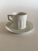 Royal 
Copenhagen 
White Fan Mocha 
Cup and Saucer 
No. 11548. The 
cup measures 
5.3 cm H. 6 cm 
diameter.