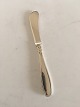 "Rex" Butter 
Knife in 
Silver. 16.6 cm 
(6 17/32"). W & 
S Sorensen
