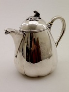 Silver jug with coat of arms stamped