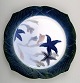 Arnold Krog for Royal Copenhagen: "Fish service" porcelain dinner plate 
decorated in colors with starfish.