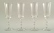 SIMON GATE FOR ORREFORS, A set of four champagne art glasses. 
Designer: Simon Gate.