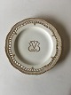 Royal 
Copenhagen 
Flora Danica 
Plate with 
Pierced Border 
og Monogram. 
2nd Quality and 
is chipped ...