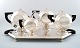 Exclusive and complete Art Deco coffee / tea service, large tray on feet, silver 
plated. Designed by Christian Fjerdingstad for Christofle (Gallia.)