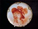 Porcelainplate. 
Berlin approx. 
1860. 
Handpainted. 
Signed "M. 
Schönfeldt". 
Diameter 22 cm.