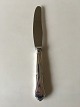 "Rita" Dinner 
Knife in 
Silver. Horsens 
Silversmithy. 
21.5 cm L