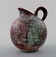 Michael Andersen. Art deco pitcher in art pottery in crackled style. Denmark 
1950s.
