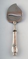 Evald Nielsen 
number 6, 
cheese slicer, 
blade in 
stainless 
steel.
Measures 22.5 
...