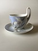 Royal 
Copenhagen Art 
Nouveau Small 
High Handled 
Cup and Saucer 
No. 81/4. Cup 
and Saucer are 
in ...