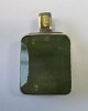 Pendant in 
silver / gold, 
Birthe 
Komselis, 
Athena (after 
1997), Aalborg, 
Denmark. With 
green ...