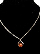 Sterling silver necklace  and pendant with amber ball