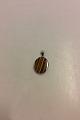 Niels Erik From 
Sterling Silver 
Pendant with 
Tigereye. 
Measures 3.2 cm 
x 2.5 cm / 1 
1/4" x 1". ...