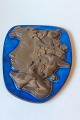 Royal 
Copenhagen 
Aluminia 
Hedegaard 
Relief of girl 
with birds no. 
161/2887.
Measures 
26,3cm x ...