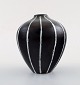 Danish ceramist.
Handmade, unique ceramic vase.