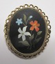 Micro mosaic 
brooch, 19th 
century. Italy. 
Oval. Framed in 
gold-plated 
brass frame. 4 
x 3.5 ...