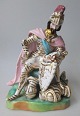 Italian 
porcelain 
figure of 
sitting prince, 
19th century. 
Polycrom 
decorated with 
gilding. ...