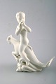 Harald Salomon 
for Rörstrand, 
blanc de chine 
/ white glazed 
figure of a 
fawn riding on 
fabel ...