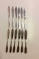 Set of 12 Evald 
Nielsen silver 
fish knives No 
19
Measures 
20,1cm / 7 
9/10”