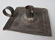 Candlestick in 
iron, 19th 
century. 
Denmark. With 
decoration and 
handles. 
Quadratic. 11.5 
x 11.5 cm.
