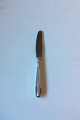 "Lotus" W. & S. 
Sørensen, 
Silver Dinner 
Knife
Measures 22 cm 
/ 8 2/3"