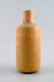 Eva Stæhr-Nielsen for Saxbo, vase in stoneware in modern design, glaze in yellow 
shades.