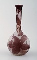 Emile Gallé art glass vase, approx. 1910s.
Decorated with violet flowers.